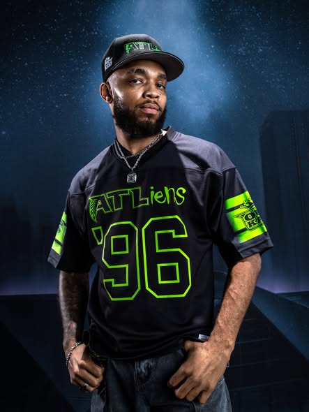 Neon green 96 jersey and fitted cap from the Atlanta Falcons x OutKast ATLiens collection